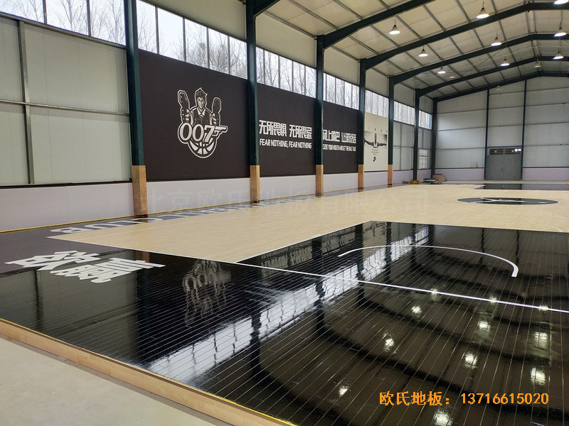 山東北環路平安行駕校籃球館體育木地板施工案例5